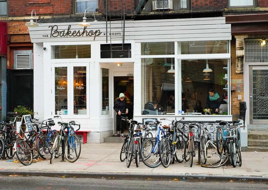 The outside of a Woops franchise shows the hip bakeshop that has curb appeal
