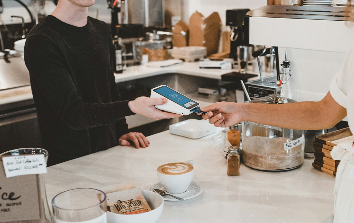 A man paying using credit card.