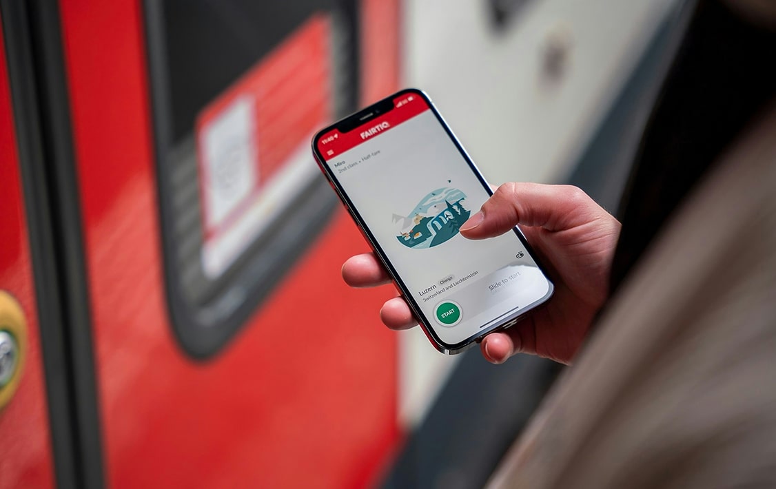 A person uses a smartphone for a transaction
